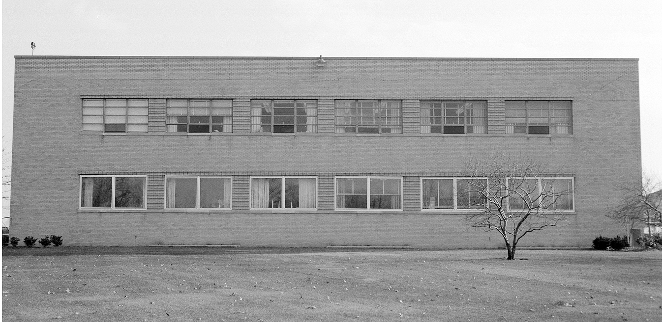 Exterior view of two-story building.