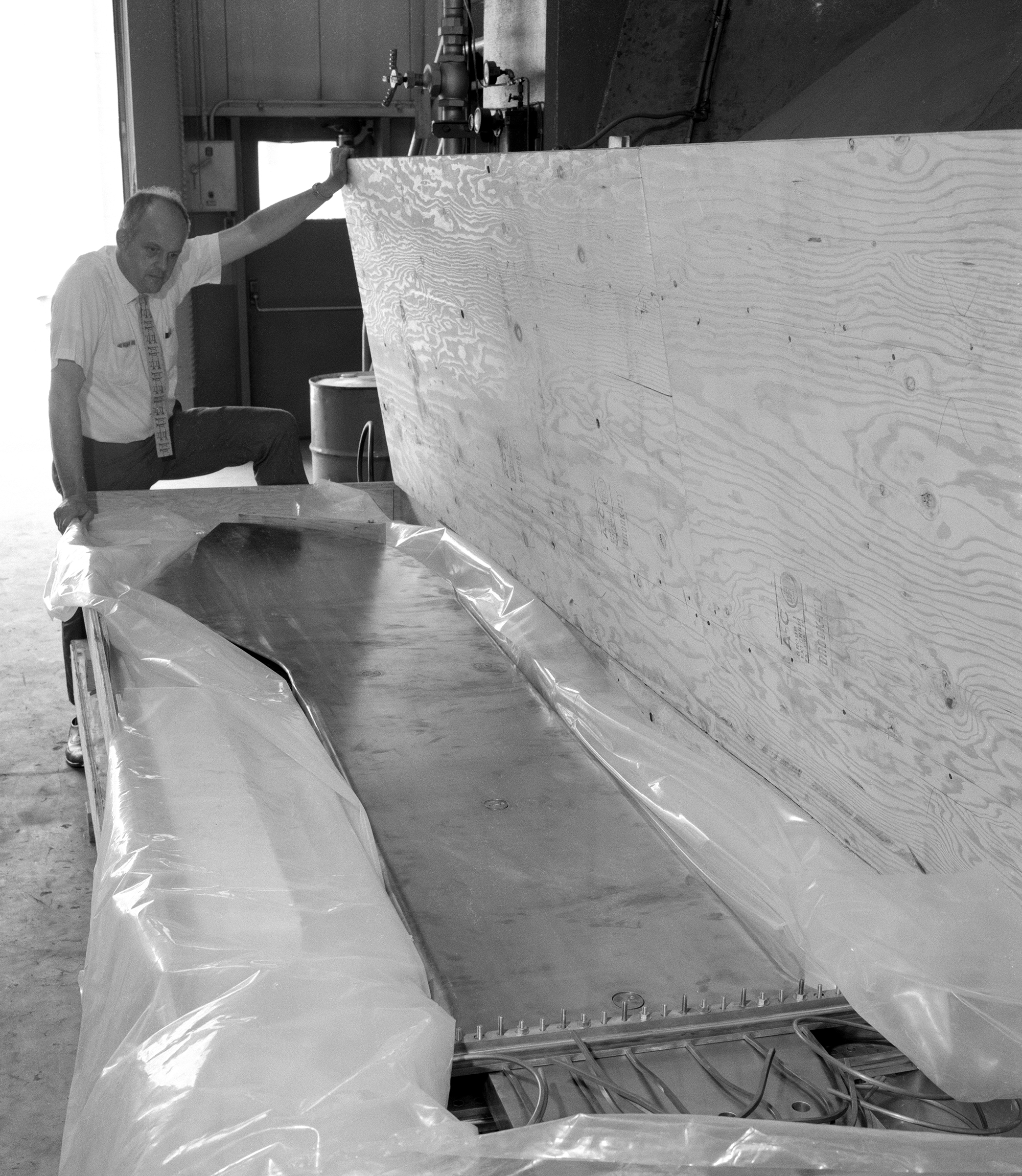 Researcher examines shipment.