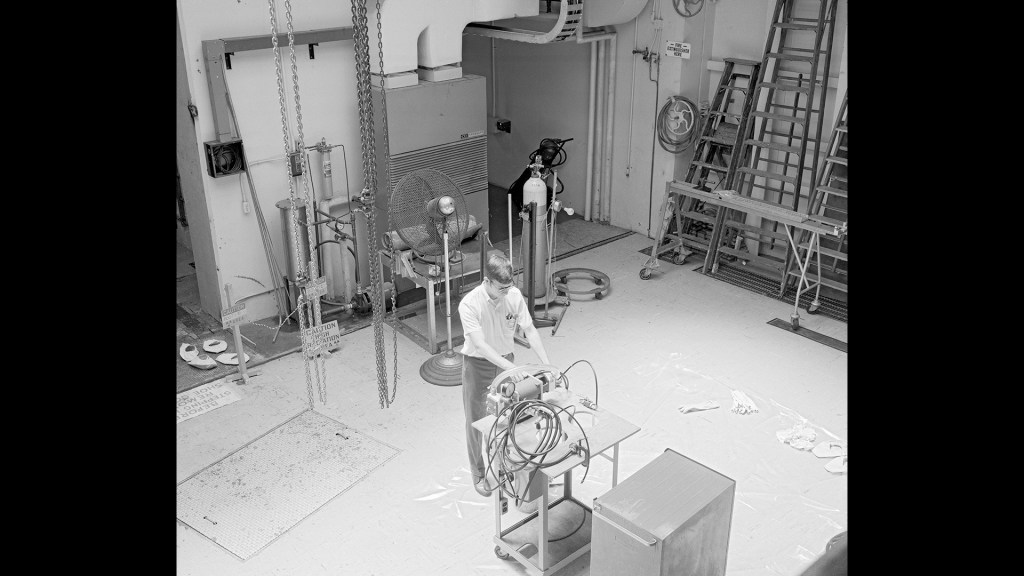 Man in large room.
