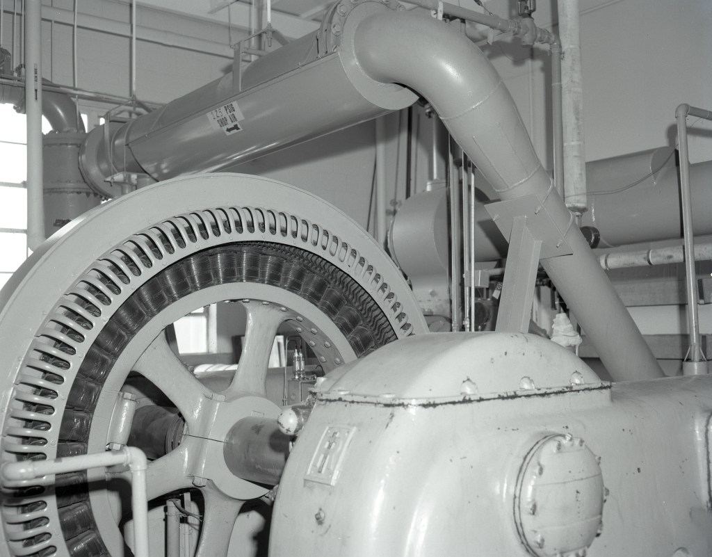 View of large air compressor inside SPL.