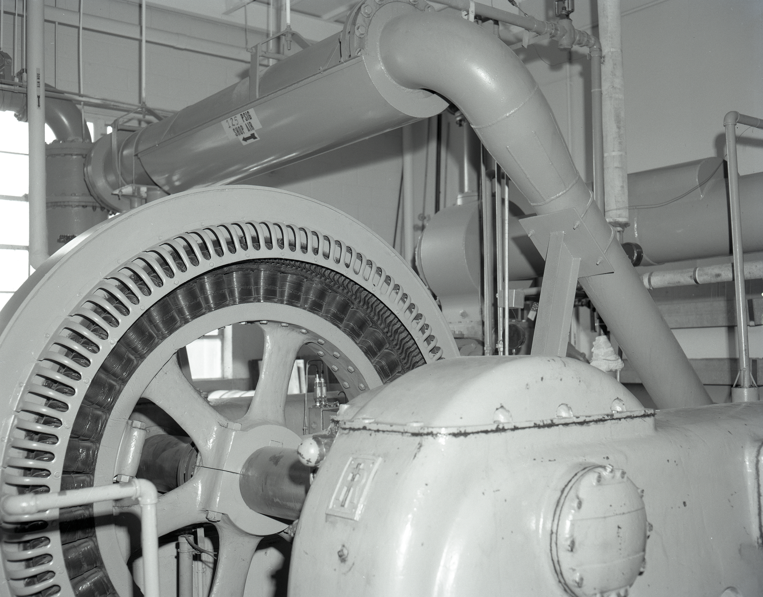 View of large air compressor inside SPL.