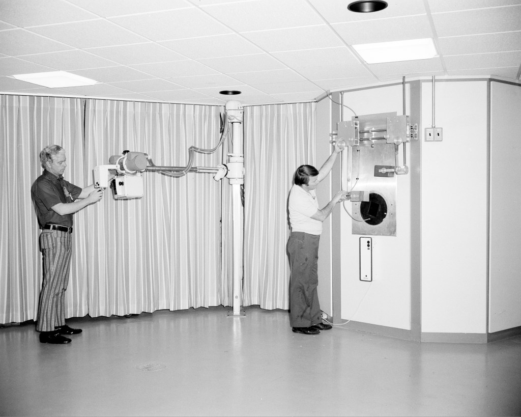 Technicians with therapy equipment.