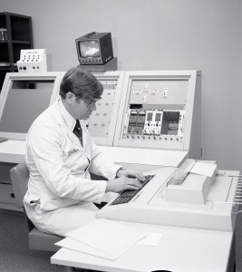 Doctor at console.