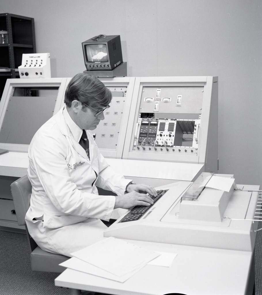 Doctor at console.