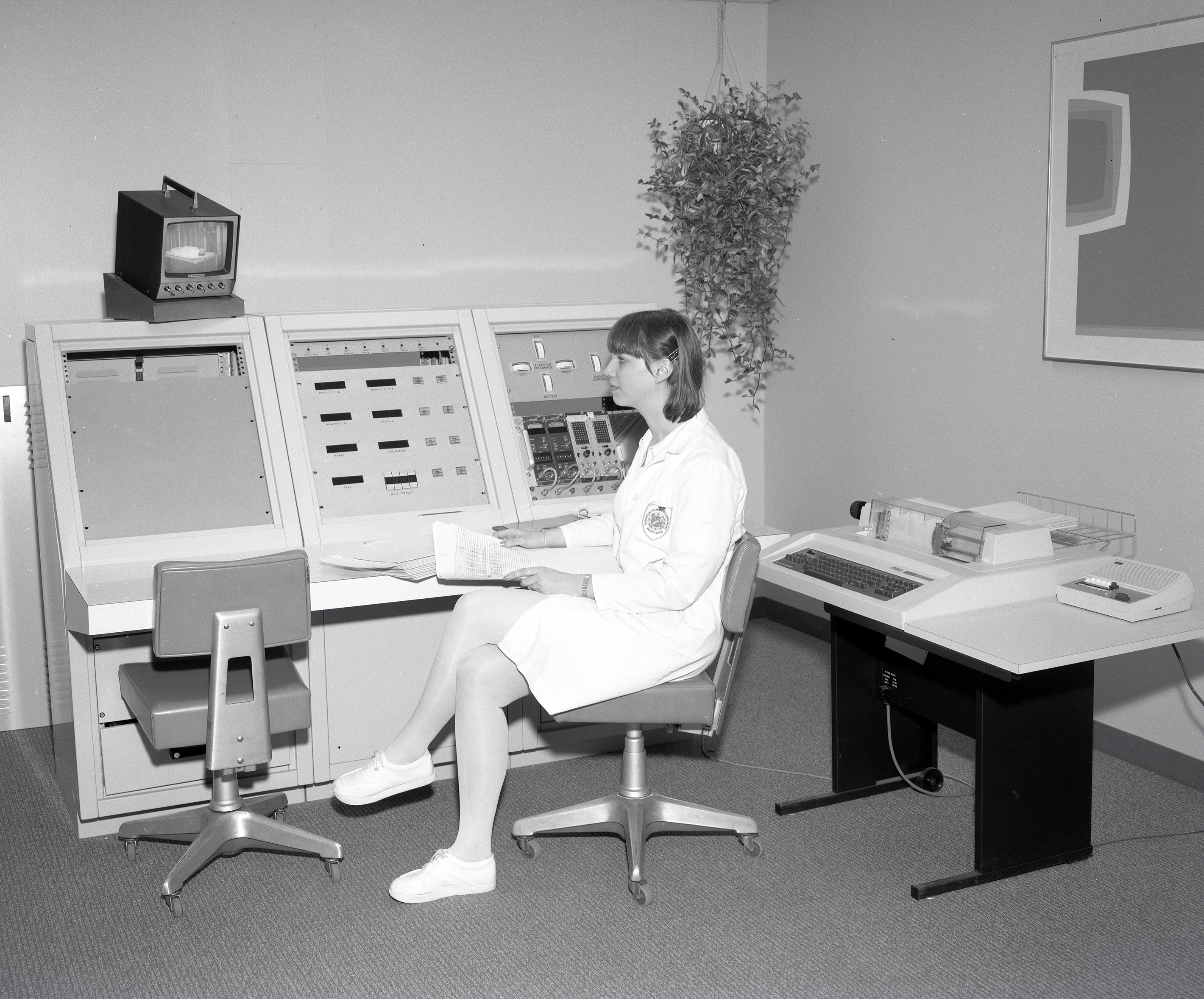 Nurse at control panel