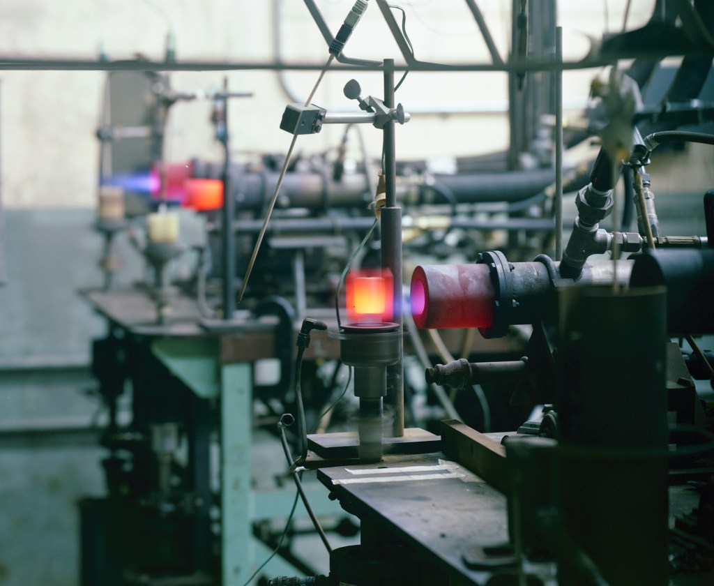 Burner rigs operating on lab table.