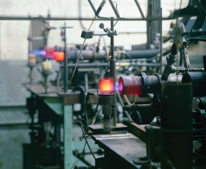Burner rigs operating on lab table.