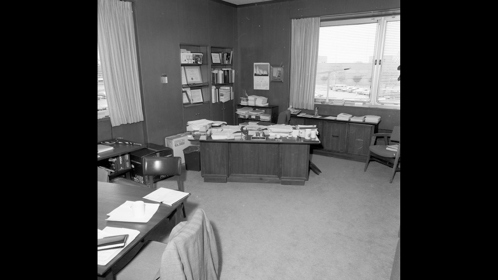 Cluttered desk in office