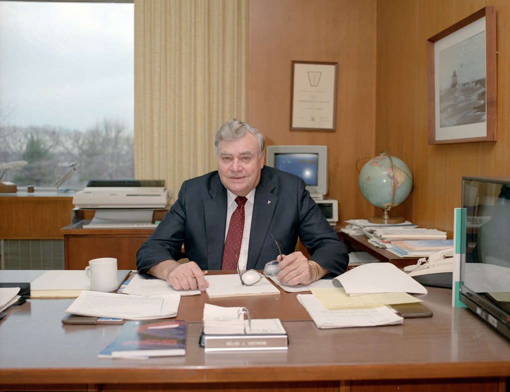 Man sitting at desk.
