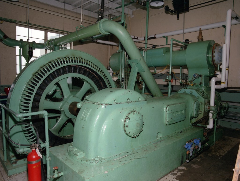 View of large air compressor inside SPL