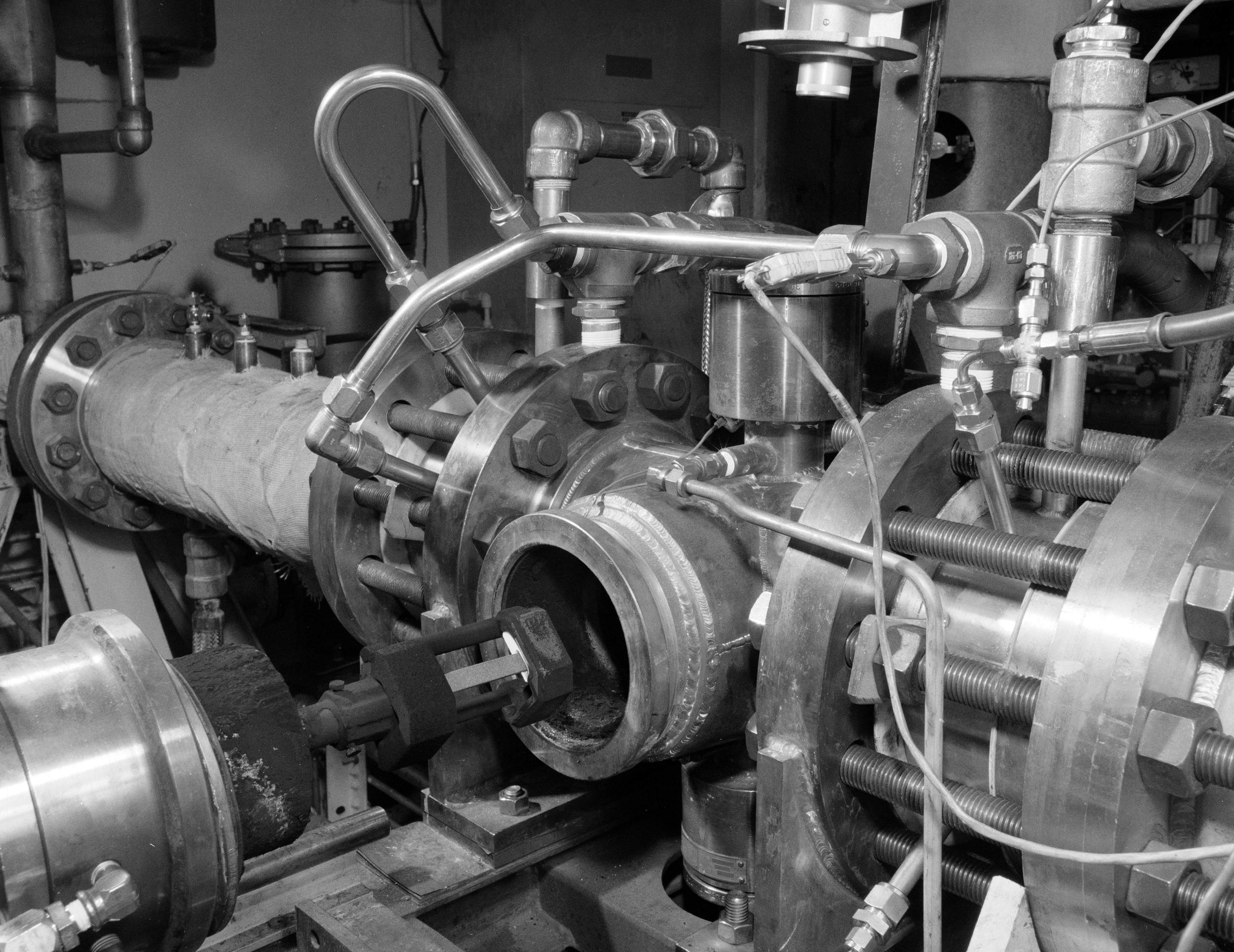 test specimen being inserted into the test section or rig.