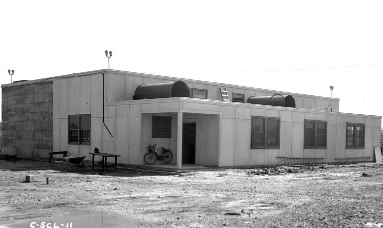 Exterior of SPL in 1943 with bicycle in front.