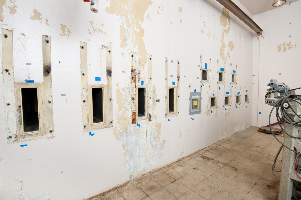Storage holes in wall.