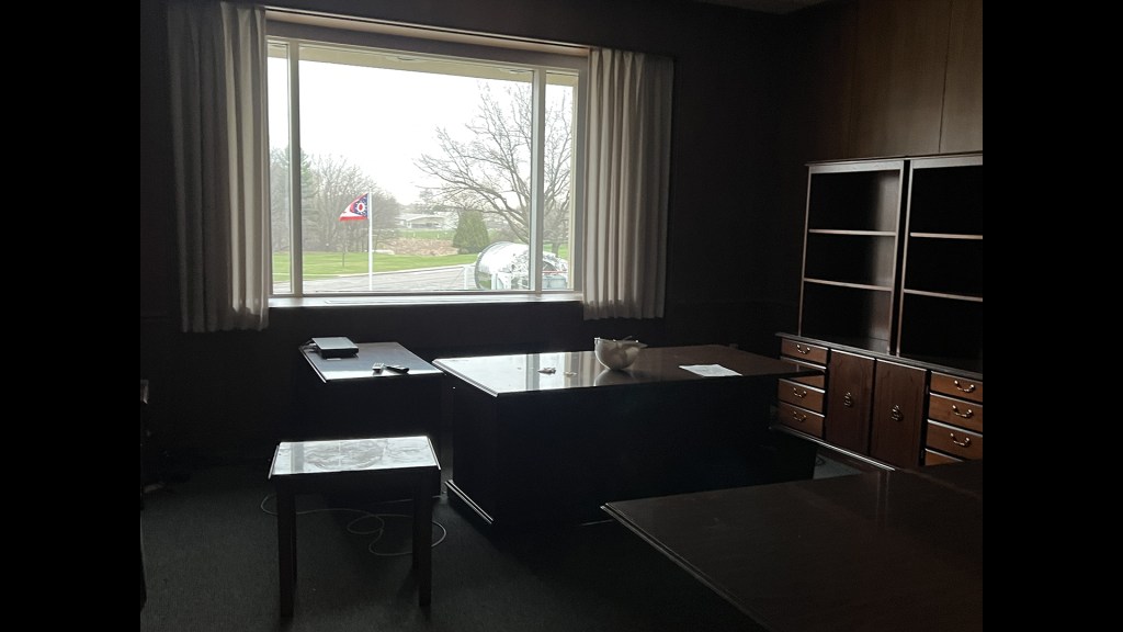 Empty office with window behind.