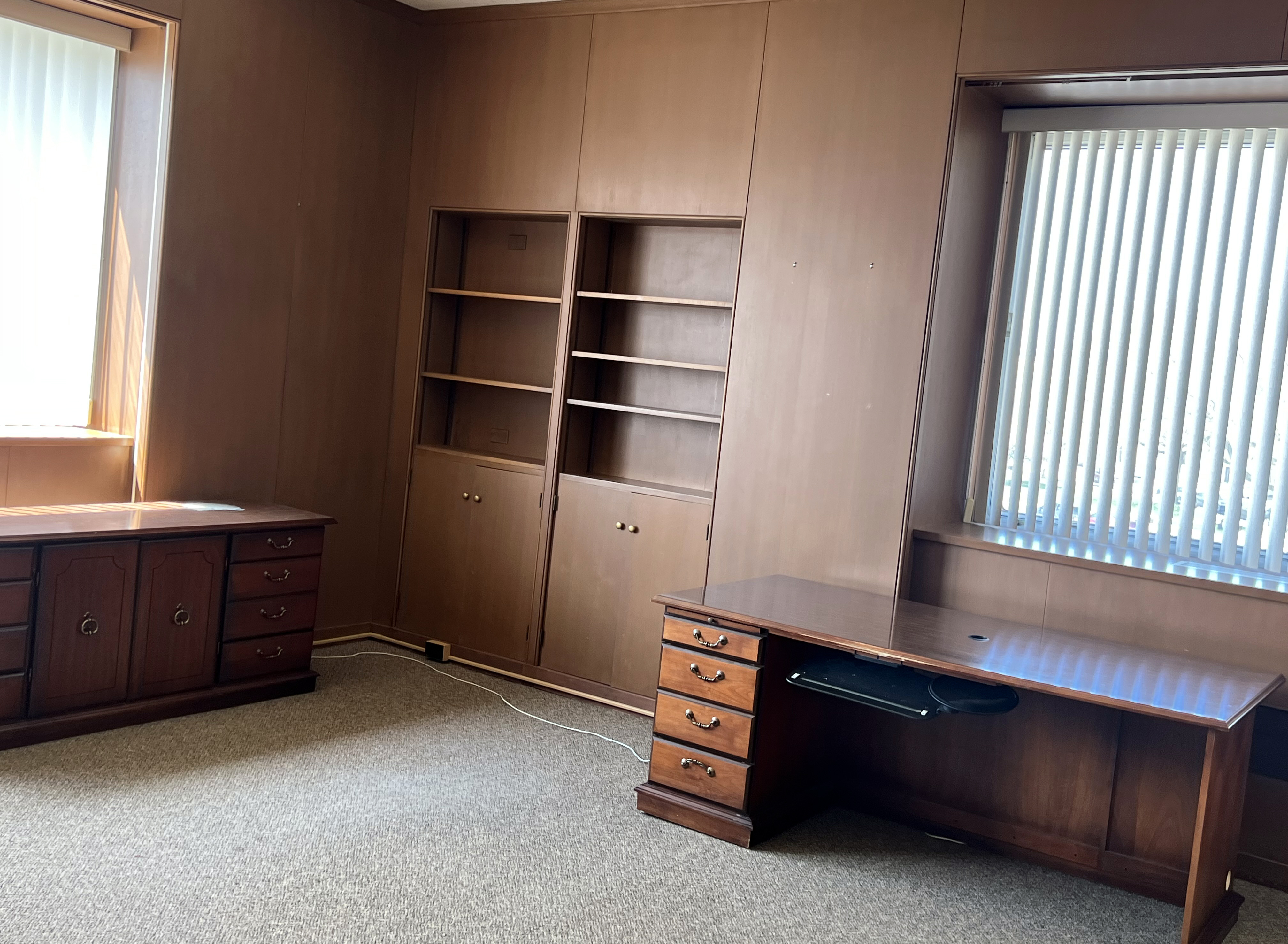 Empty office with paneling.