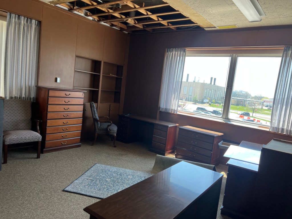 Empty office with paneling.