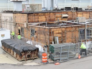 Exterior siding being removed.