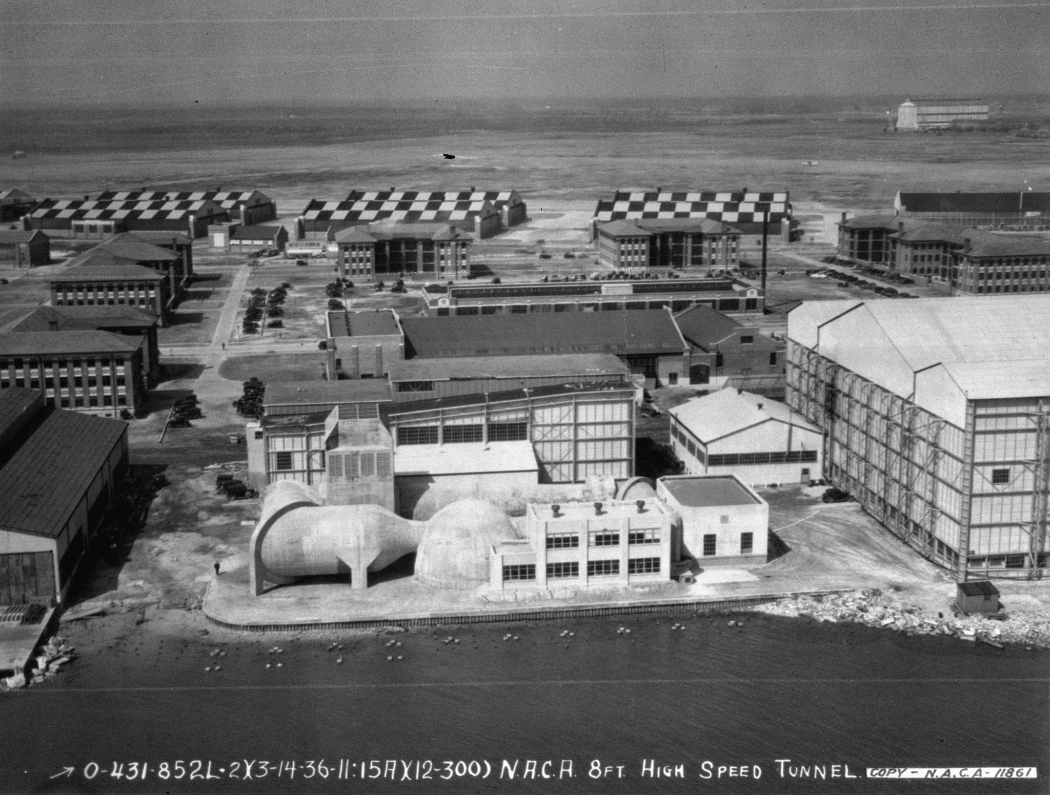 Aerial view of Langley Research Center on March 13, 1936 showing the High Speed Tunnel, Propeller Research Tunnel and Full-Scale Tunnel
