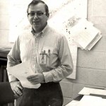 Man standing in office.