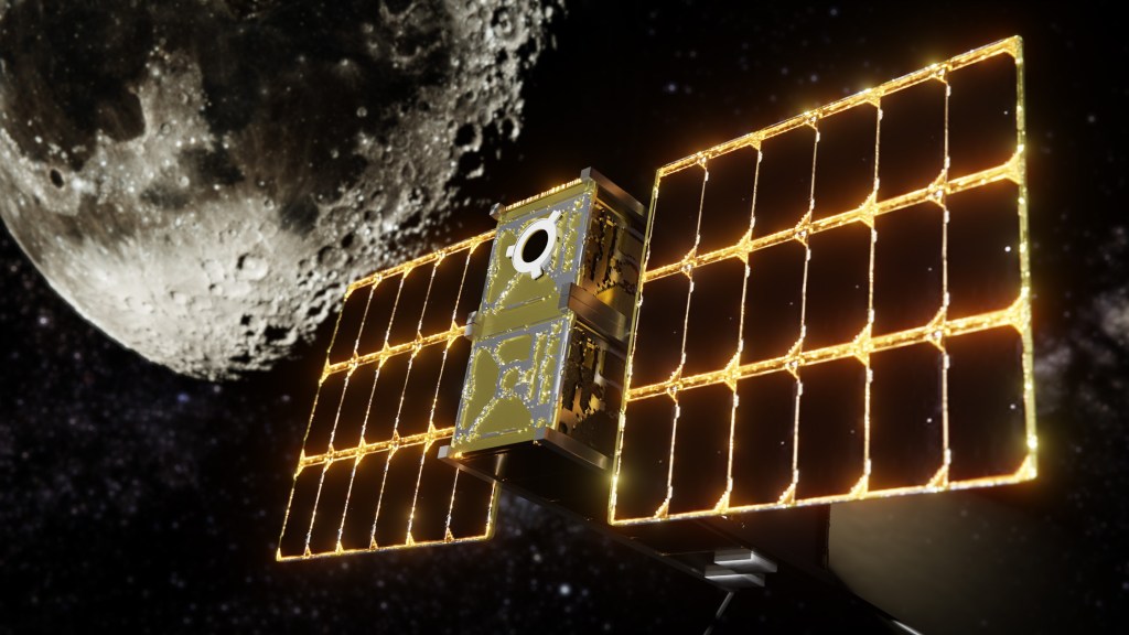 Computer-generated image of a 3x2x1U CubeSat with a cylindrical radiation detector visible on its short face and solar arrays deployed on both sides. The Moon and stars are visible in the background.