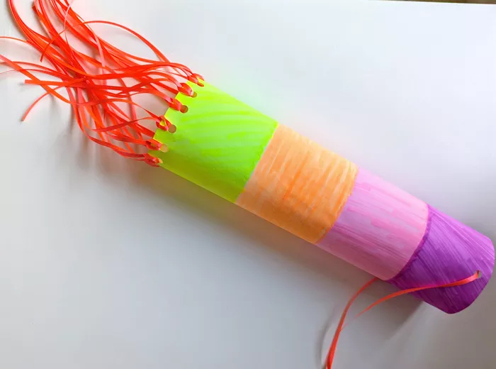 Final image of a crafted windsock with bright colors.