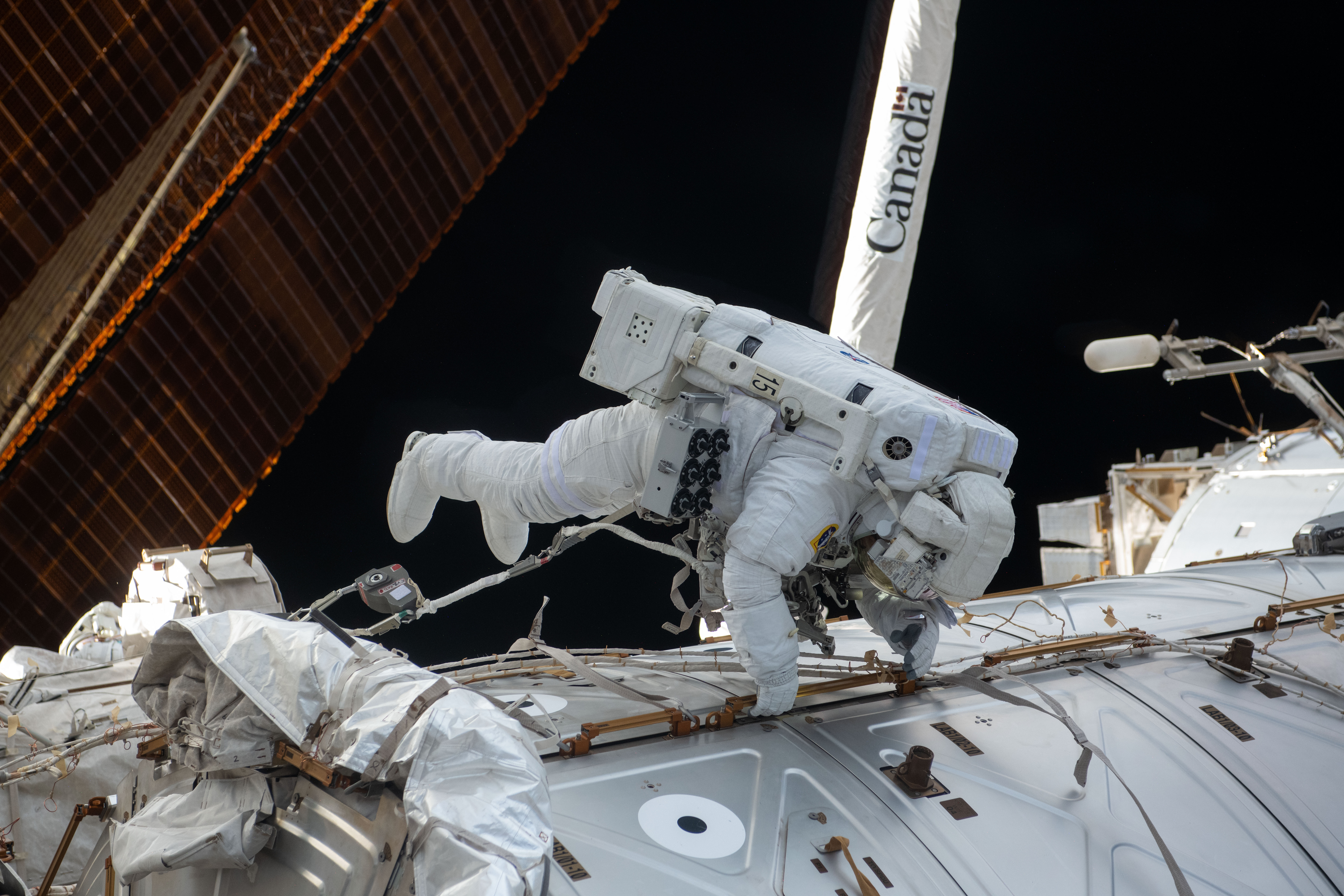 NASA astronaut Butch Wilmore works outside the International Space Station