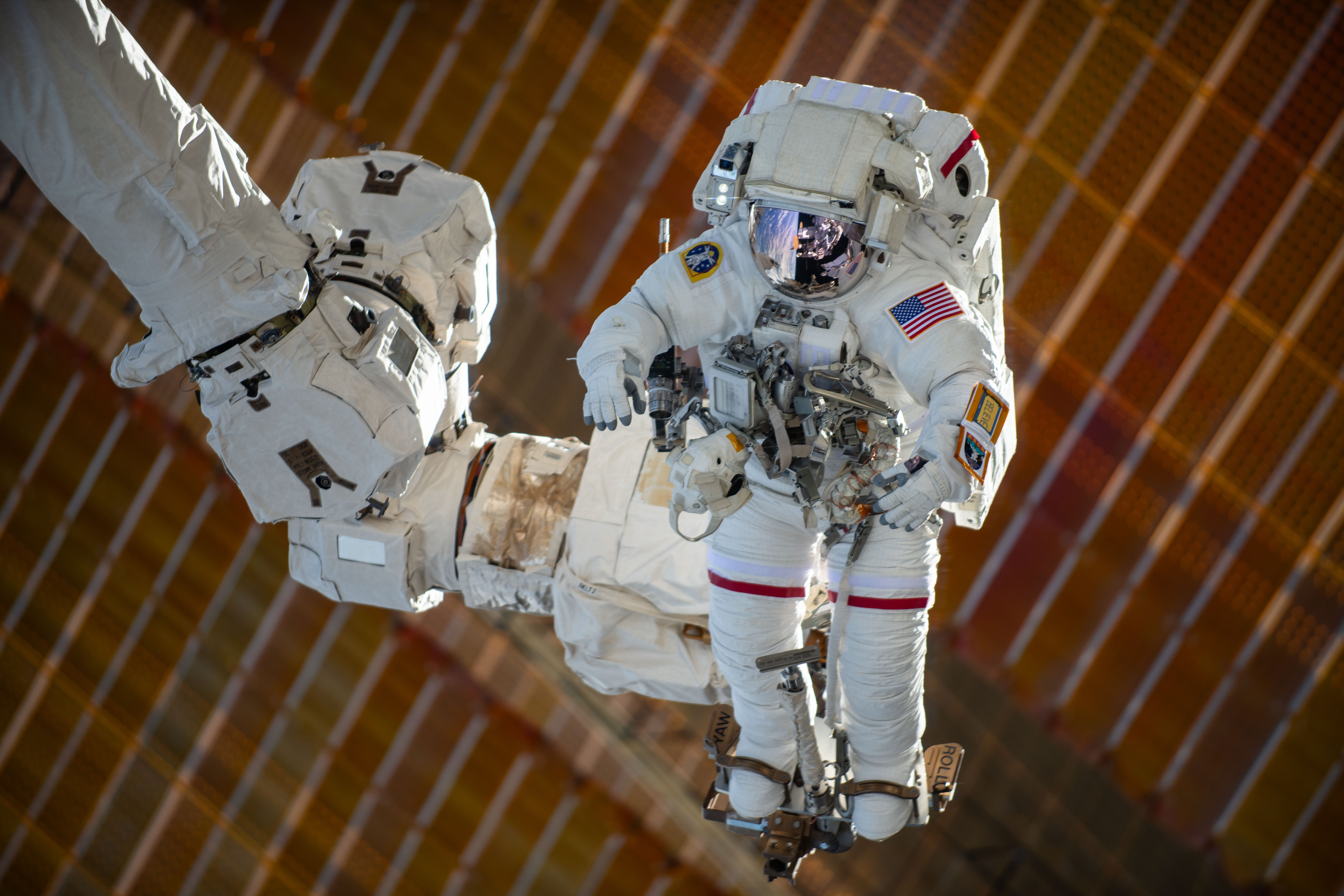 NASA astronaut Suni Williams rides the Canadarm2 robotic arm