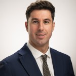 Studio portrait of Aaron McKinnon