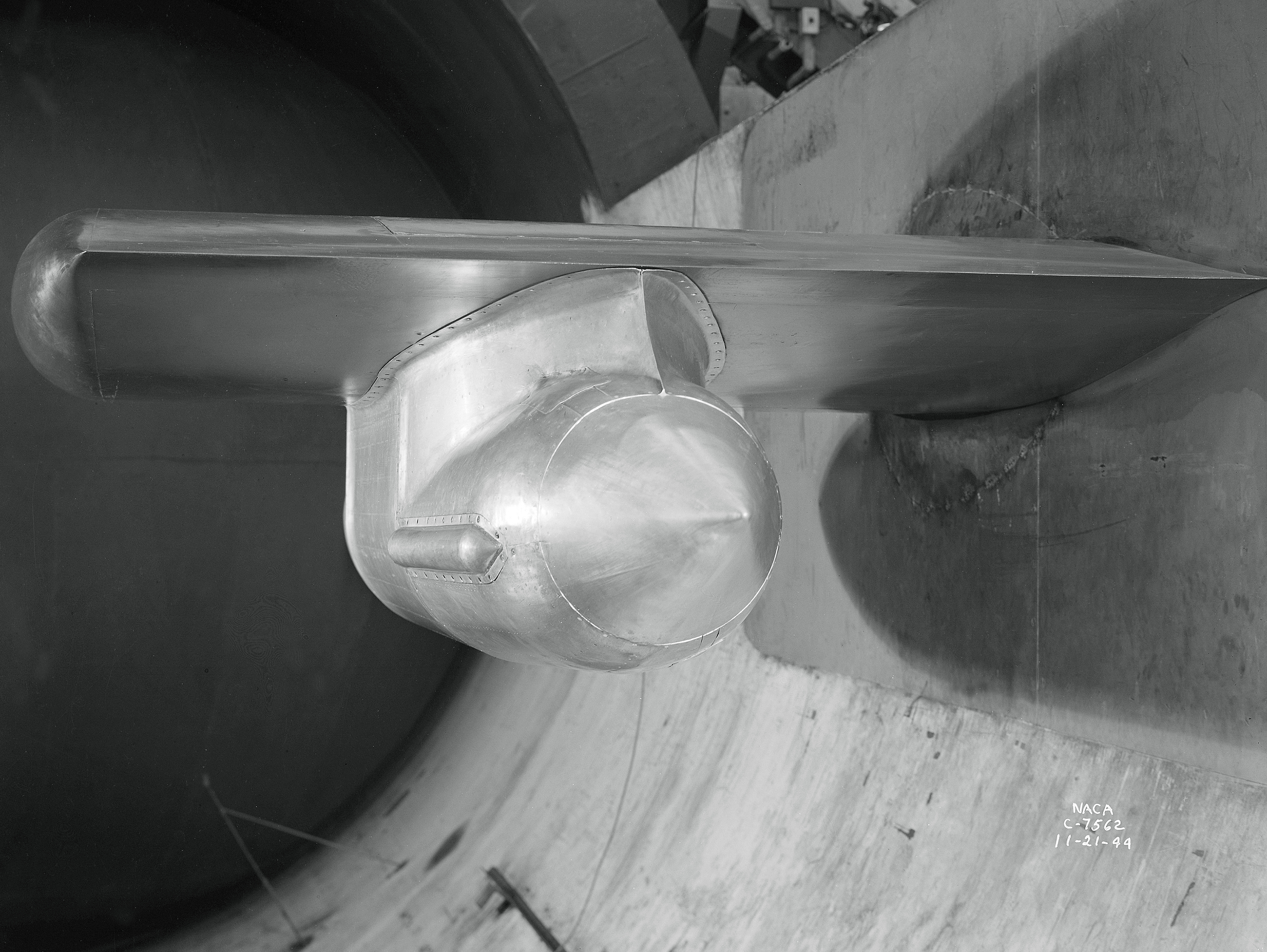 Westinghouse 19B model suspended from wing span in AWT test section.