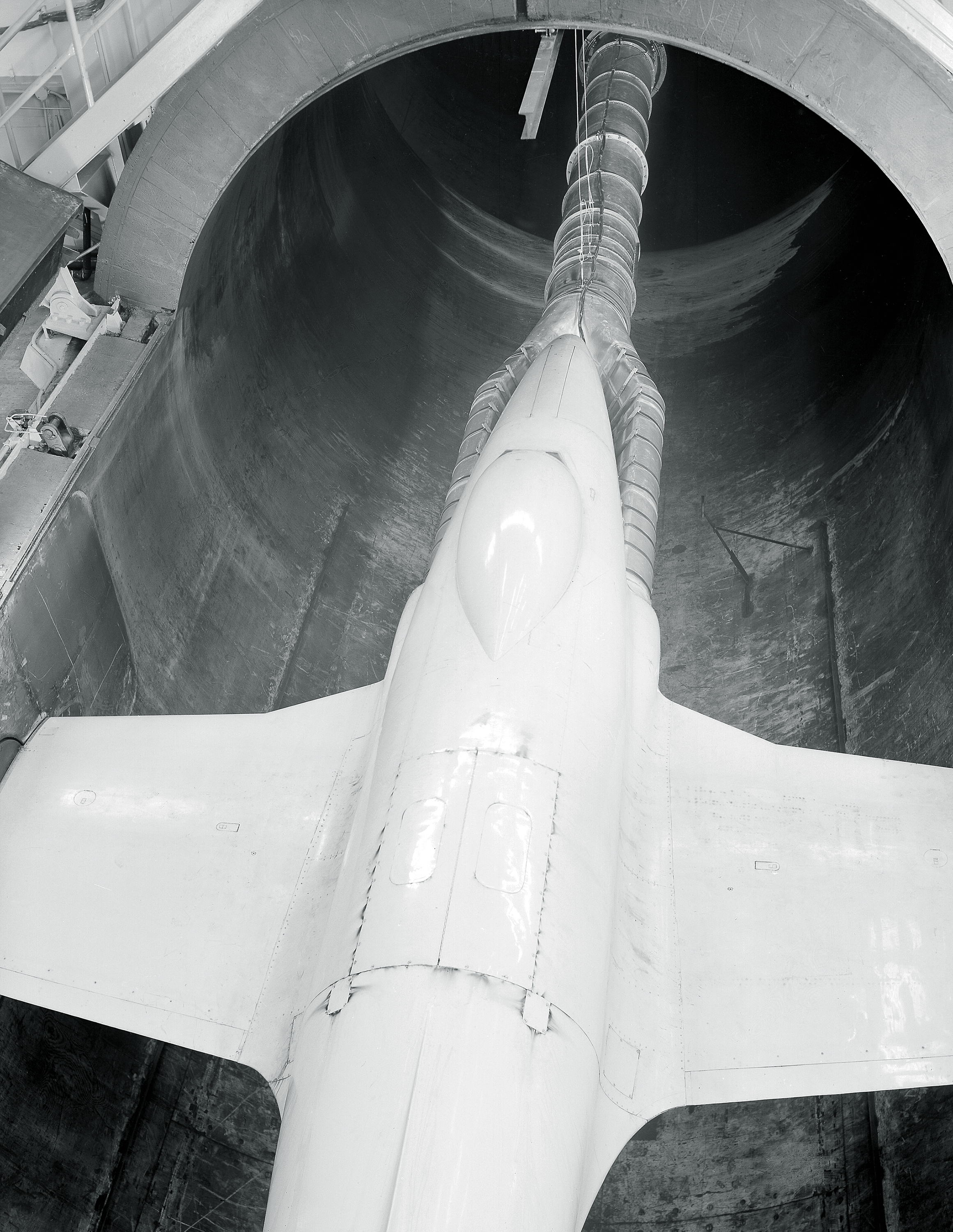 View from above of air pipe linked to engines on P-80 aircraft in AWT