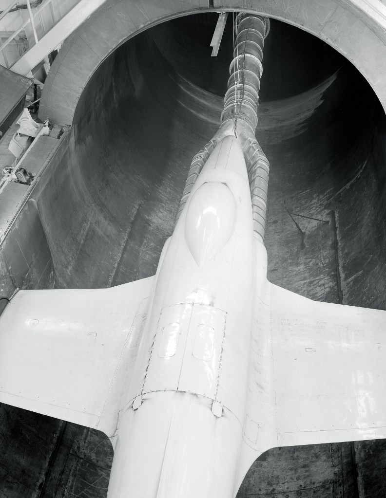 View from above of air pipe linked to engines on P-80 aircraft in AWT