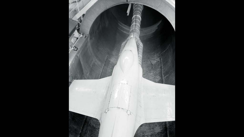 View from above of air pipe linked to engines on P-80 aircraft in AWT