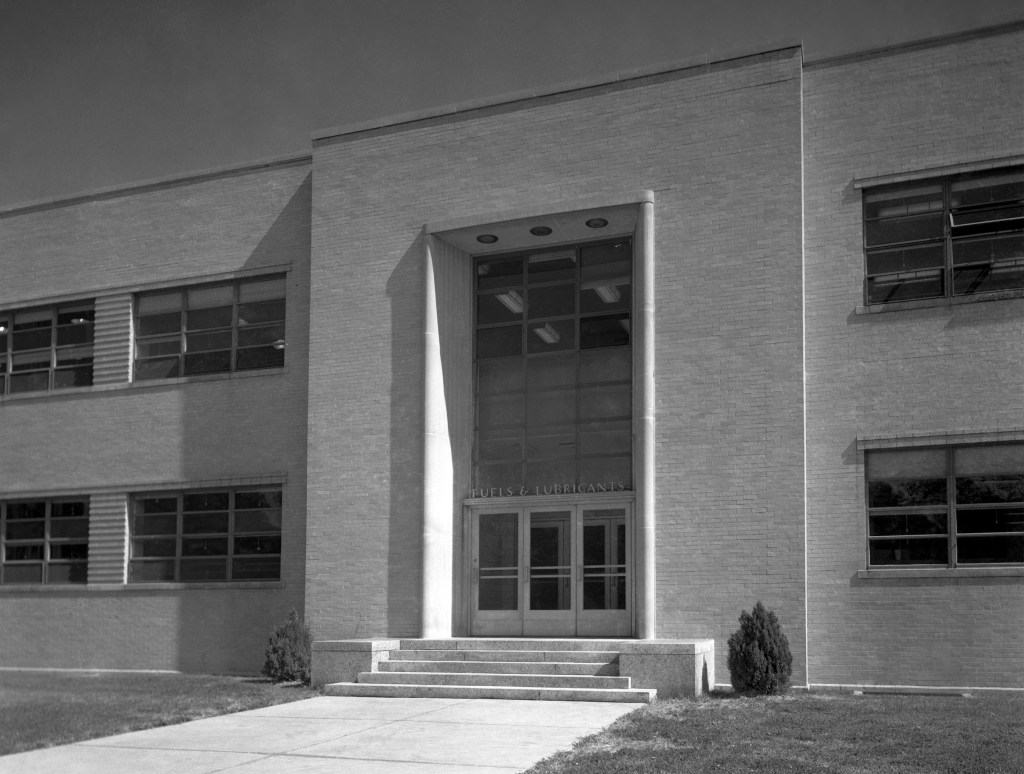 View of main entrance to brick building.