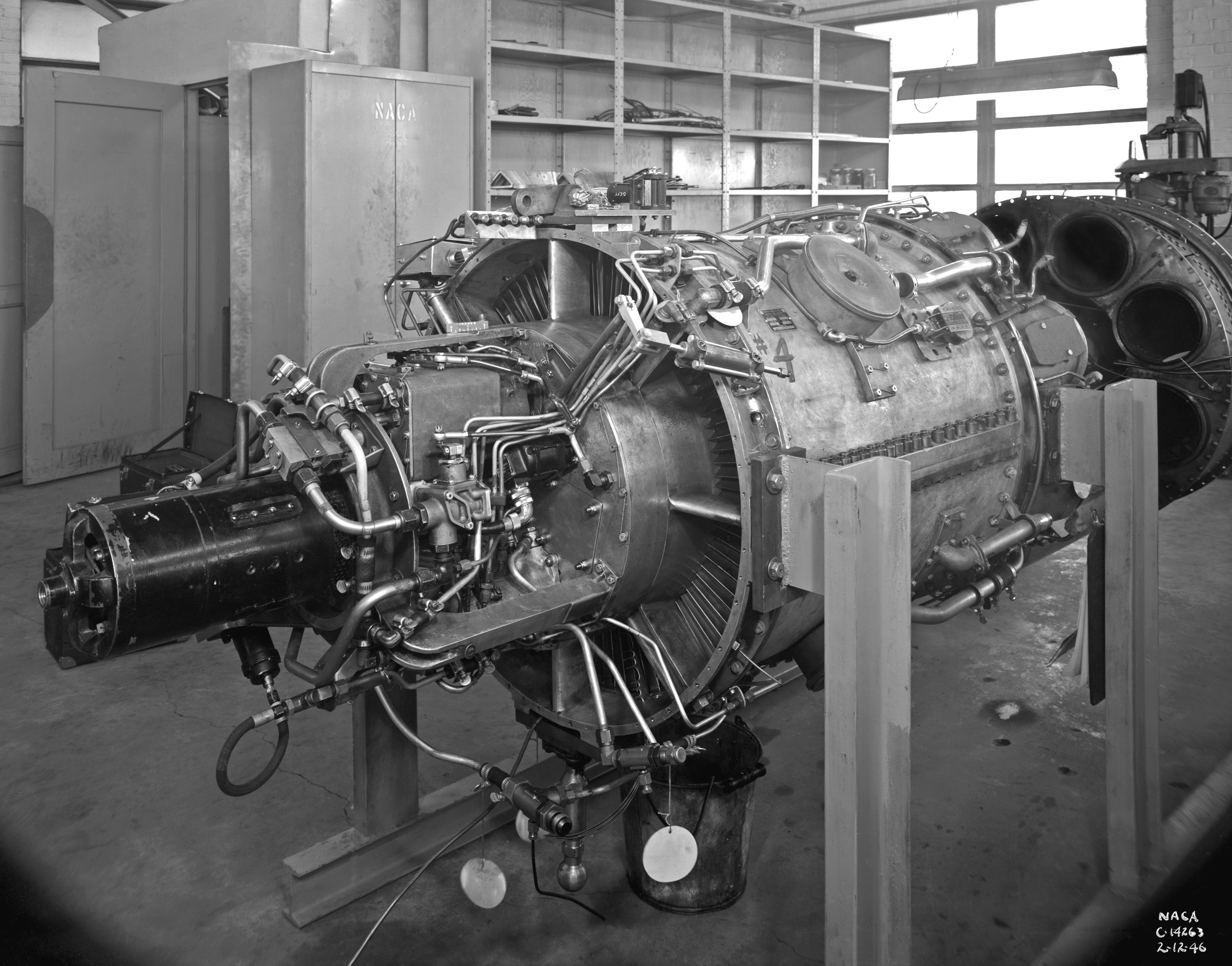 TG-180 engine on stand in Altitude Wind Tunnel shop