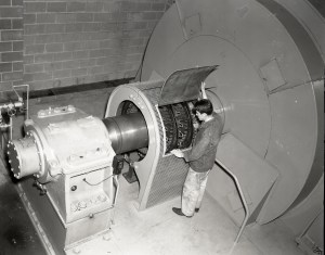 Technician examines drive motor