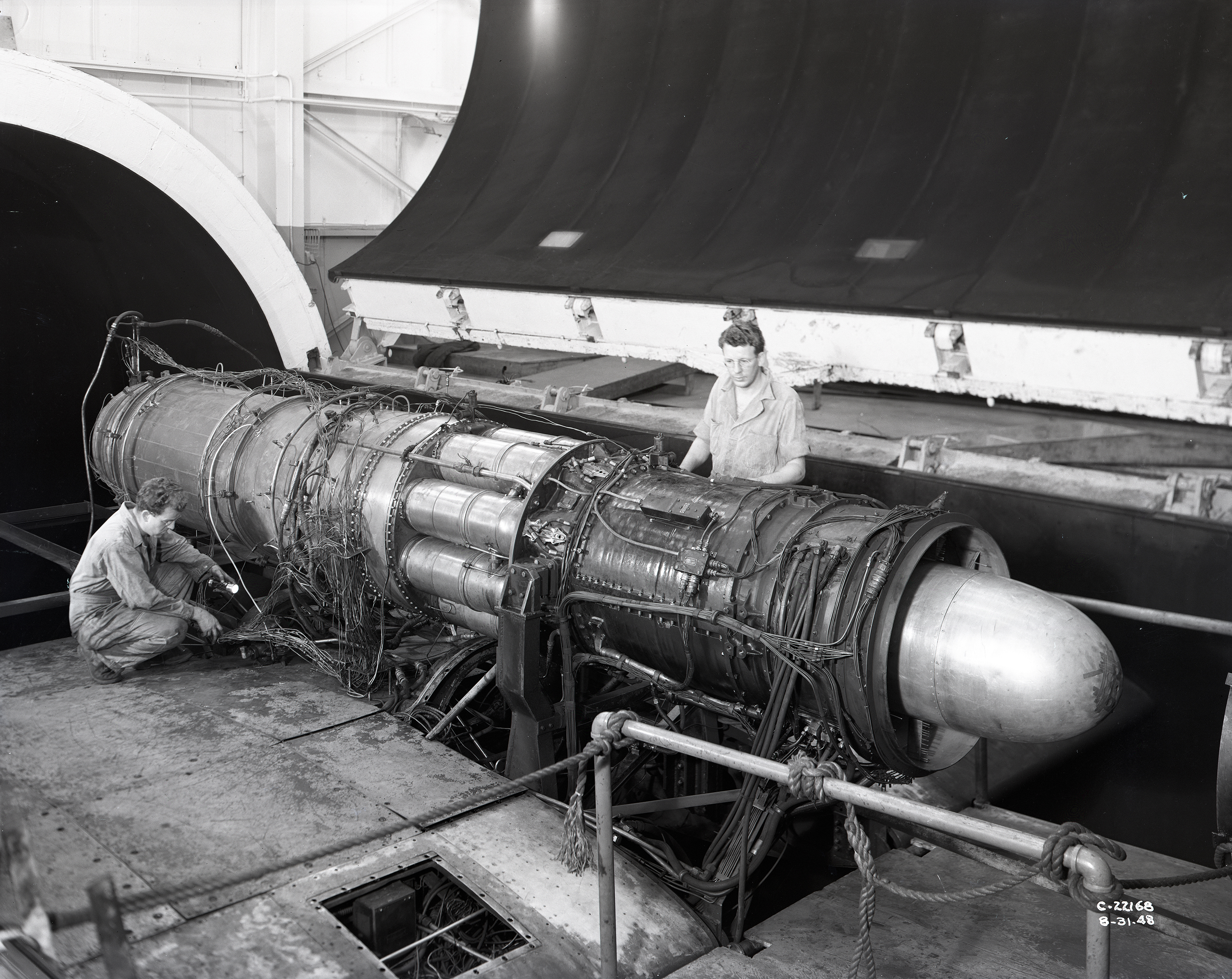 Mechanics work on TG-190 engine in AWT test section