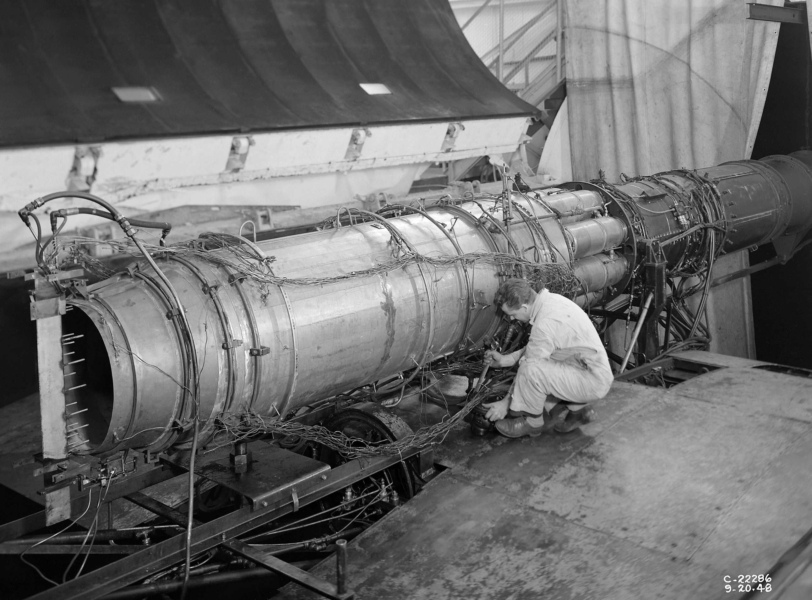 Mechanics work on TG-190 engine in AWT test section