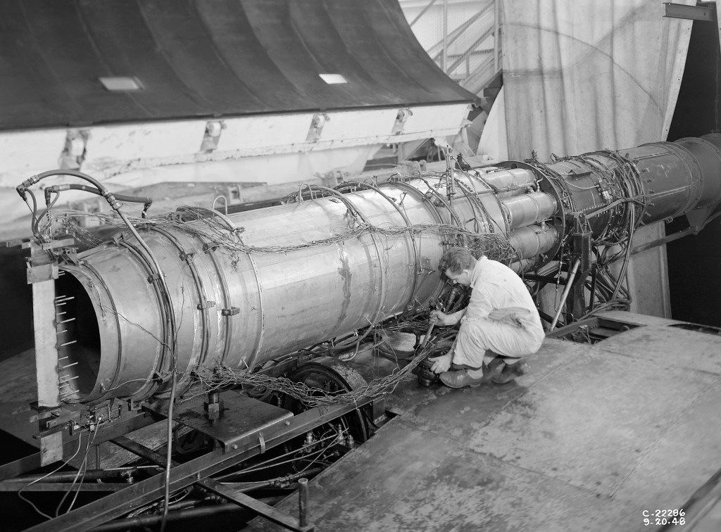 Mechanics work on TG-190 engine in AWT test section
