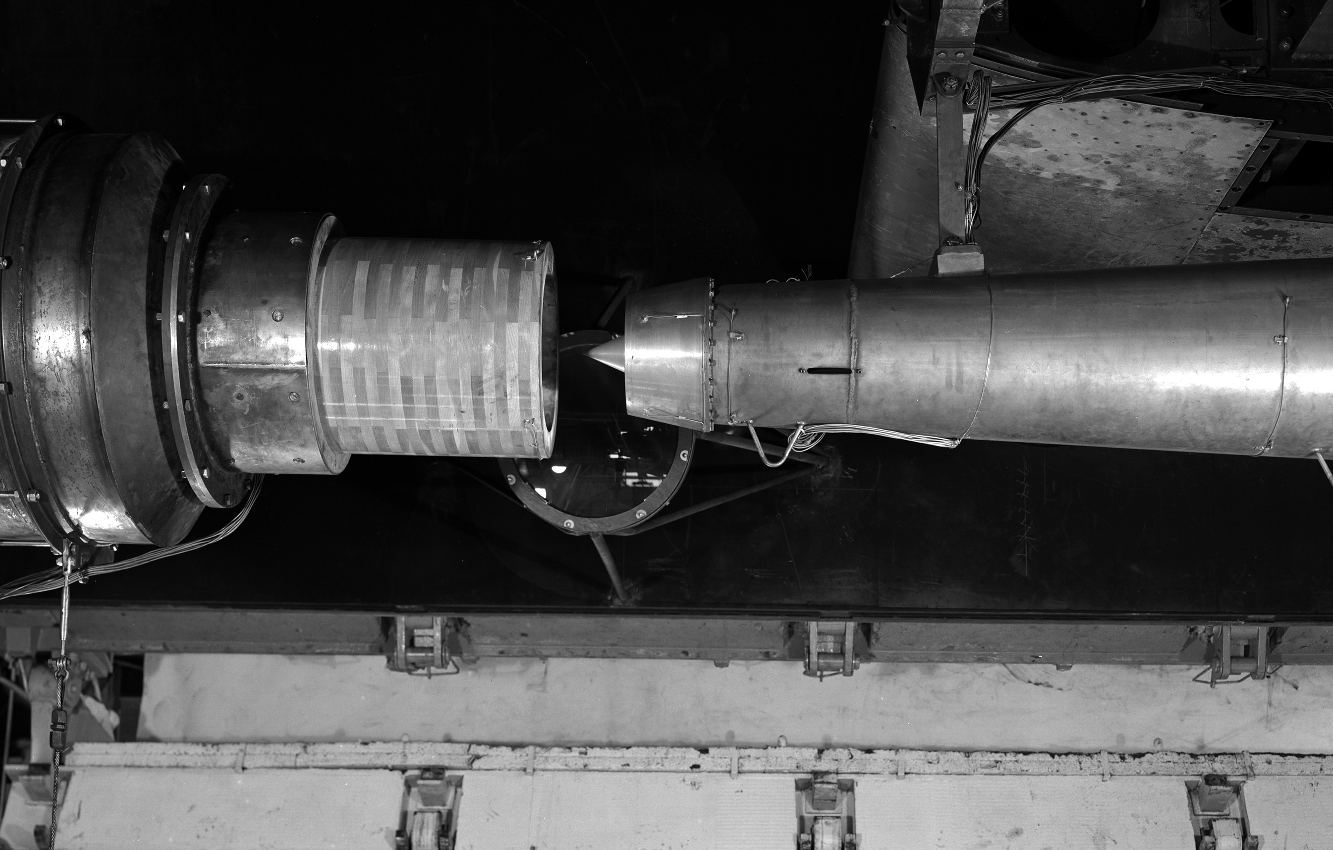 View down at ramjet in test section in front of air duct