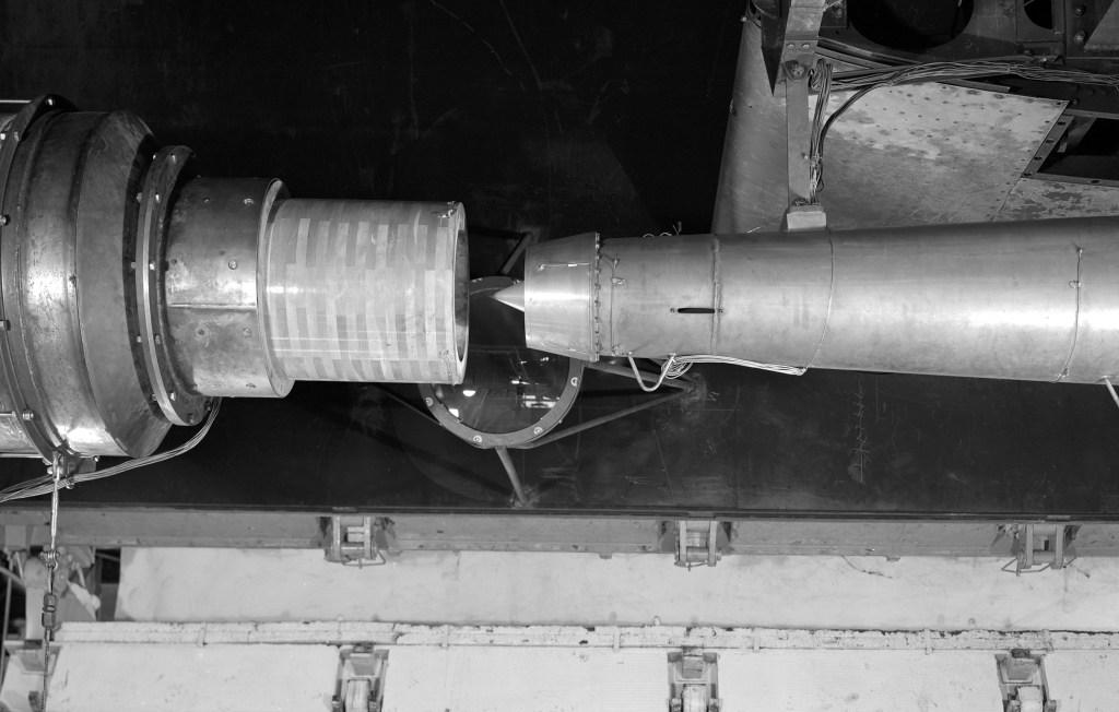 View down at ramjet in test section in front of air duct