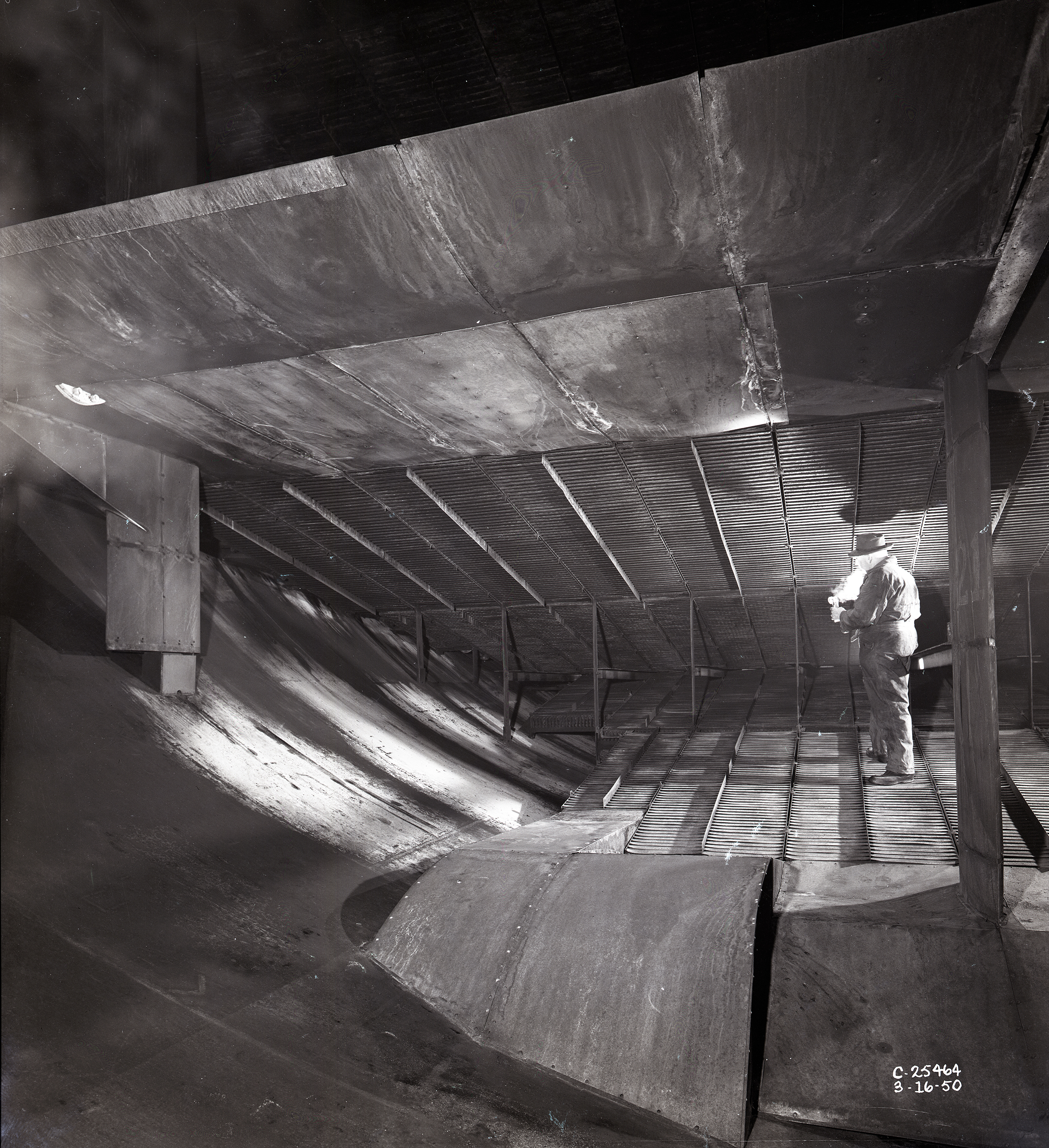Man standing on cooling coils in AWT