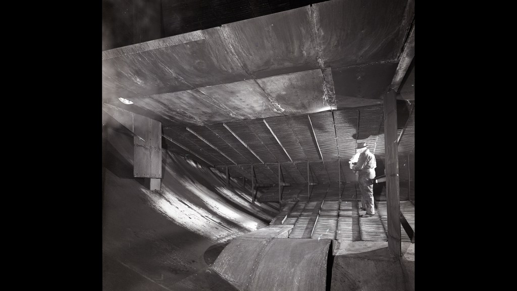 Man standing on cooling coils in AWT