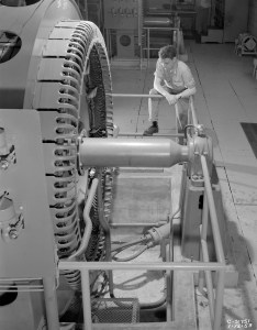 Technician with Compressor in Exhauster Building Addition