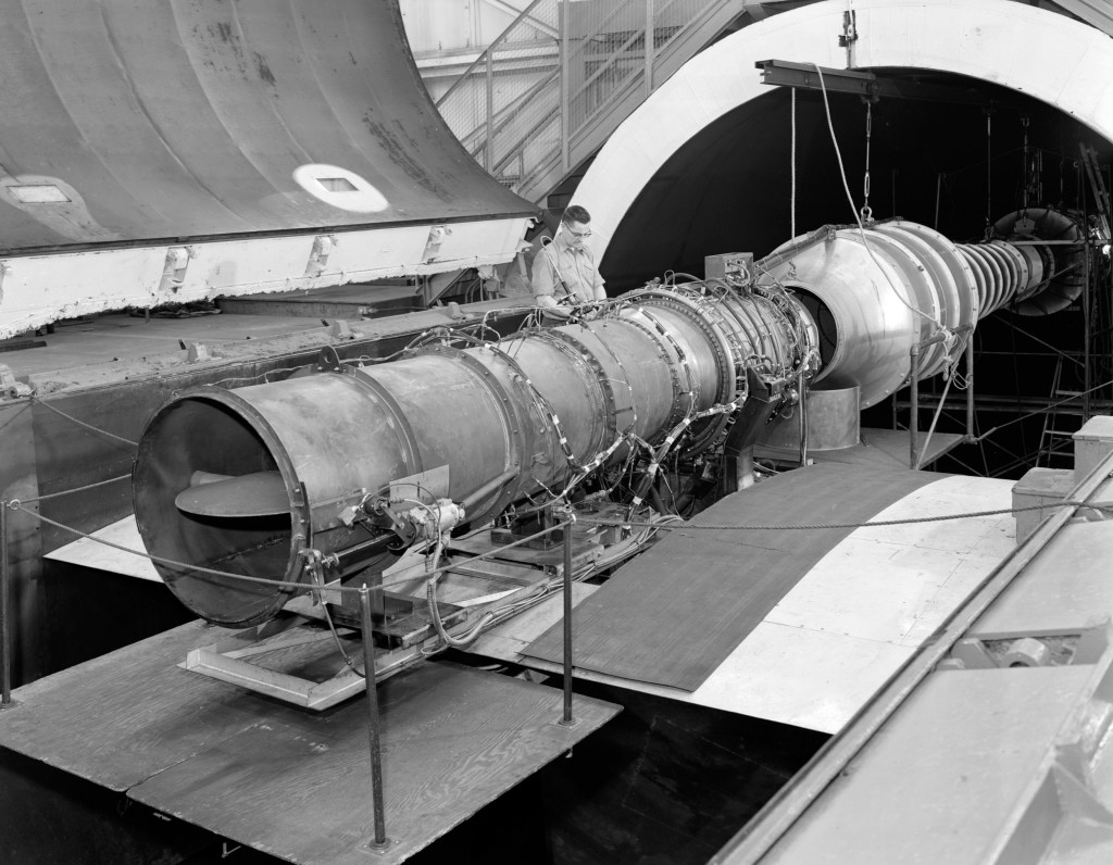 Mechanics work on J65 engine in AWT test section