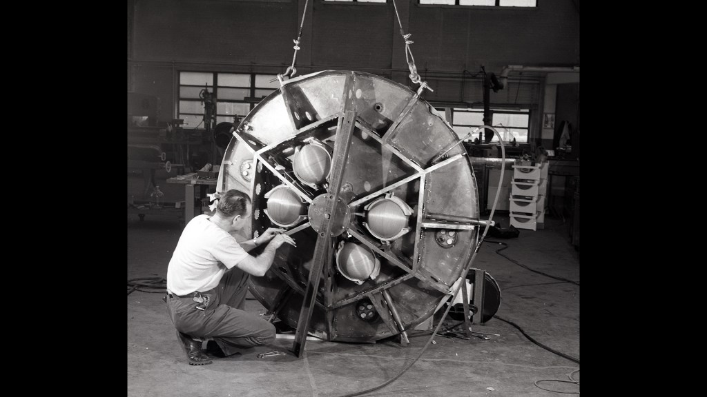 Mechanic with Big Joe capsule.