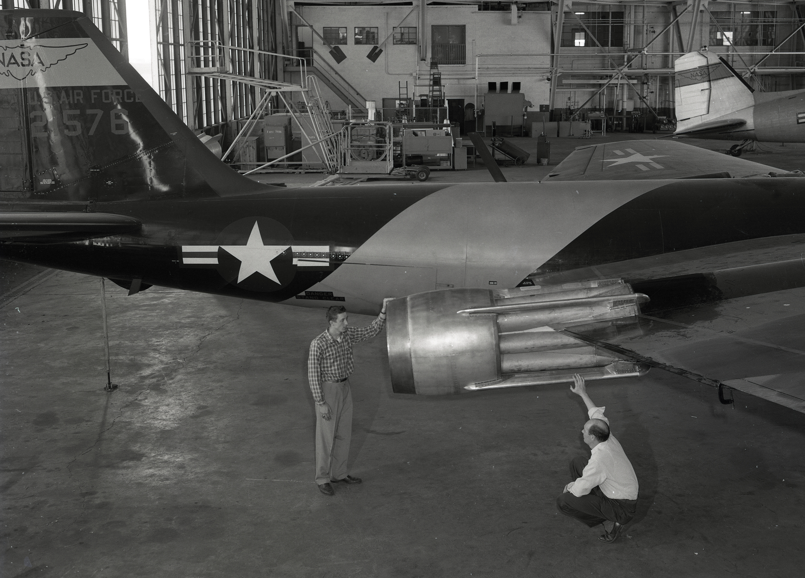 B-57B in hangar with ejector on engine.