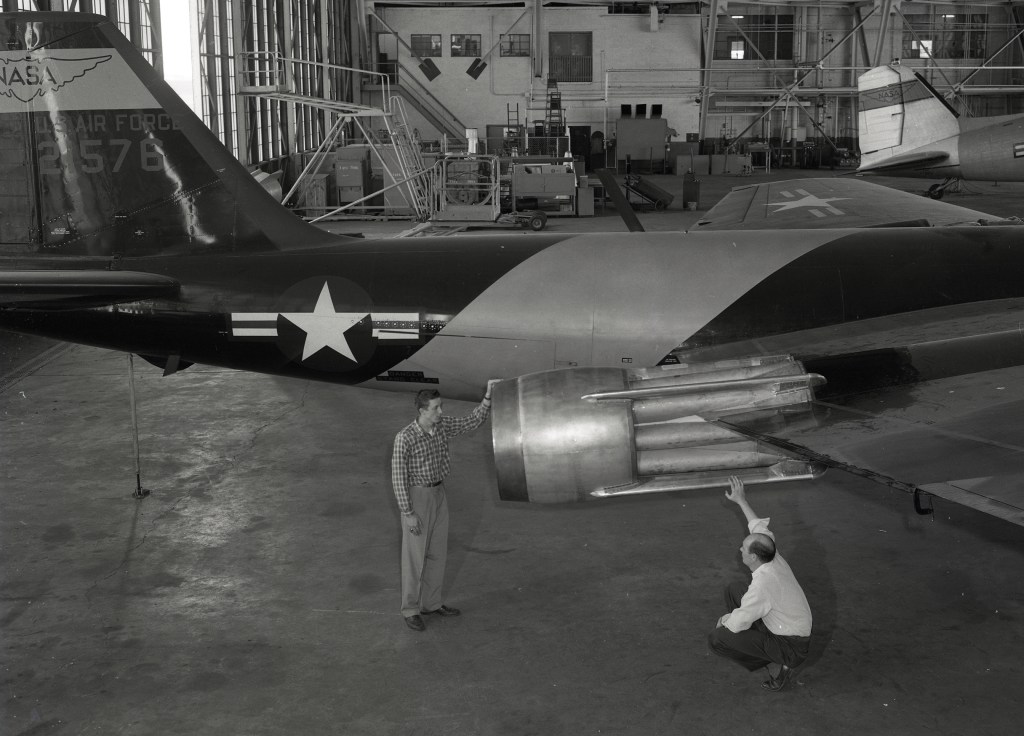 B-57B in hangar with ejector on engine.