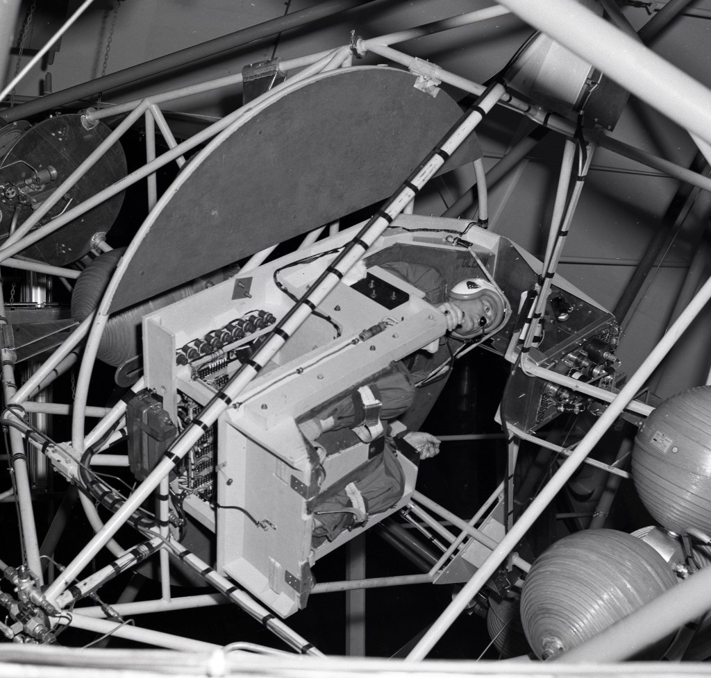 Man in rotating test rig.