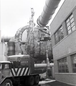 Crane removes tunnel outer shell and insulation