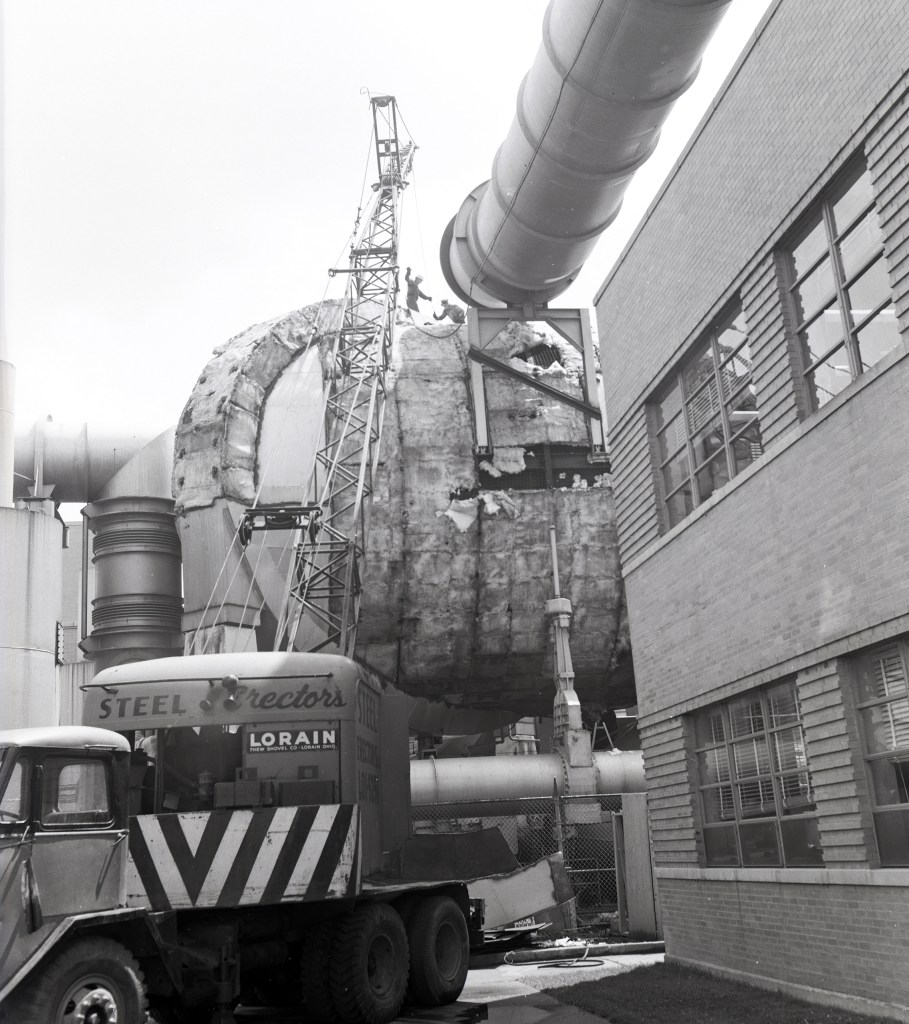 Crane removes tunnel outer shell and insulation